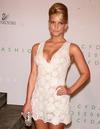 Jessica Simpson exposed her cleavage in a low cut dress