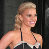 Jessica Simpson exposed in a tiny skirt