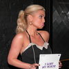 Jessica Simpson exposed in a tiny skirt