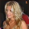 Jessica Simpson exposed her cleavage in a tight dress