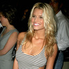 Jessica Simpson exposed her cleavage in a tight dress