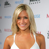 Kristin Cavallari exposed her cleavage in a white dress