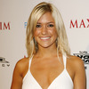 Kristin Cavallari exposed her cleavage in a white dress