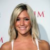 Kristin Cavallari exposed her cleavage in a white dress