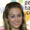 Lauren Conrad exposed her cleavage in a lace dress