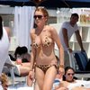 Lindsay Lohan exposed her boobs and butt in a bikini