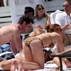 Lindsay Lohan exposed her boobs and butt in a bikini