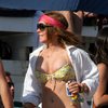Lindsay Lohan exposed her boobs and butt in a bikinis