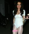 Lindsay Lohan exposed her lace bra peek and leotard in halloween costumes