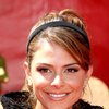 Maria Menounos exposed her cleavage in a lace dress