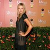 Maria Sharapova exposed her beige slip in a see through dress