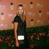 Maria Sharapova exposed her beige slip in a see through dress