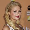 Paris Hilton exposed her black bra in an open dress