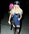 Paris Hilton exposed her cleavage and butt upskirt in a halloween costume