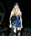 Paris Hilton exposed her cleavage and butt upskirt in a halloween costume