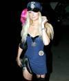 Paris Hilton exposed her cleavage and butt upskirt in a halloween costume