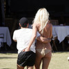 Victoria Silvstedt exposed her butt in a gold bikini