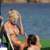 Victoria Silvstedt exposed her butt in a gold bikini